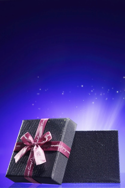 close-up of gift box against blue background