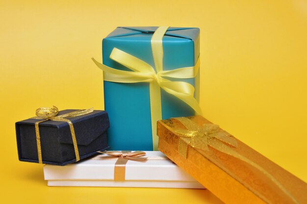 Photo close-up of gift box against yellow background