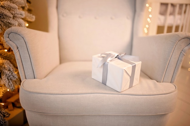 Close up gift box on armchair