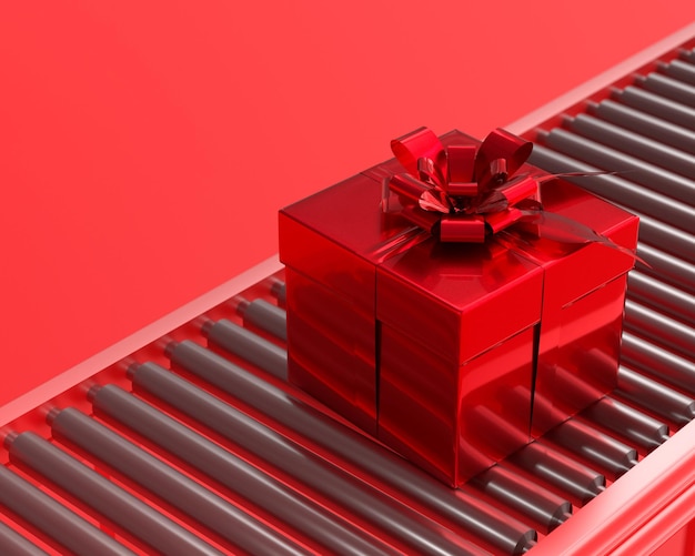 Photo close-up of gift box on conveyor belt against red background