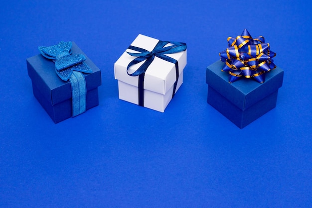 Close-up of gifts on blue background