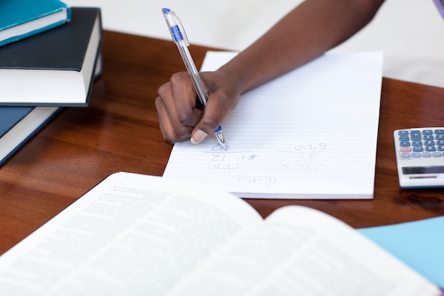 close up of an girl doing her homework