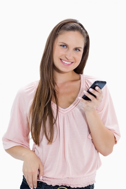 Close-up of a girl holding a mobile phone