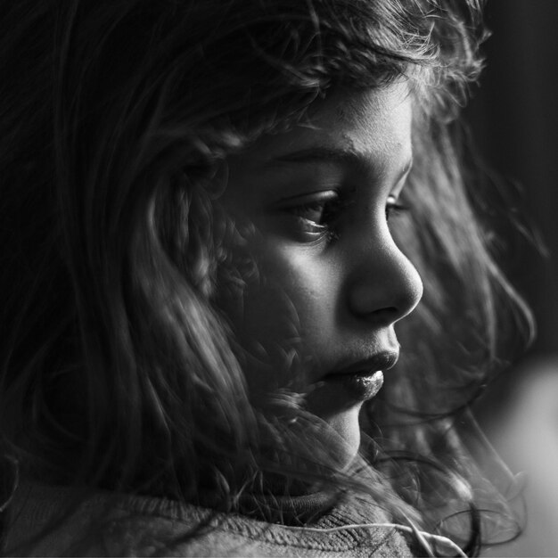 Close-up of girl looking away