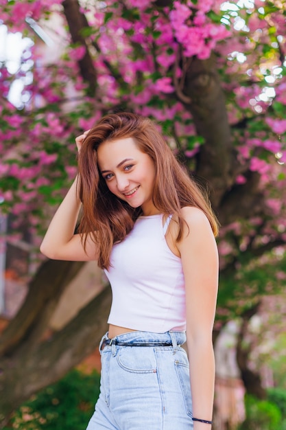 Close up of a girl who poses outside