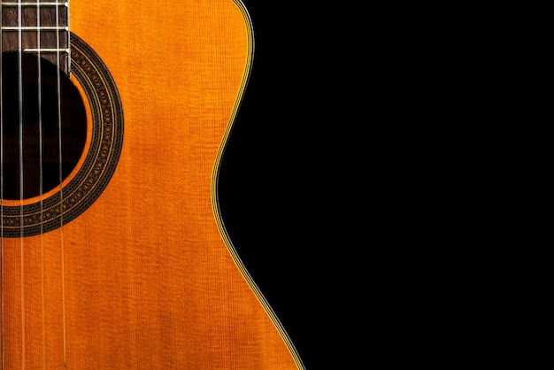 Close-up gitaar in zwarte achtergrond, abstracte, klassieke gitaar