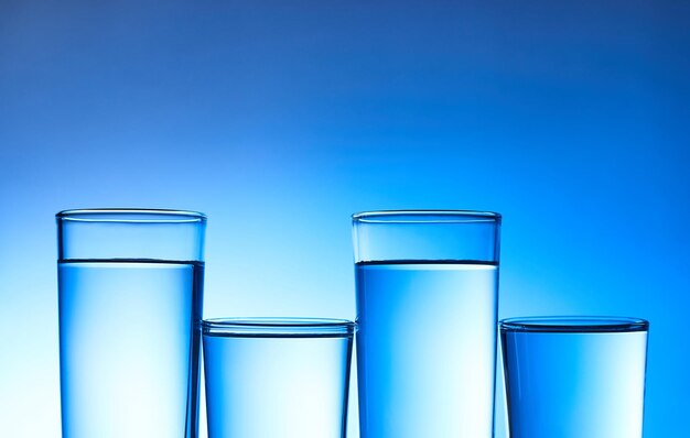 Close-up of glass against blue background