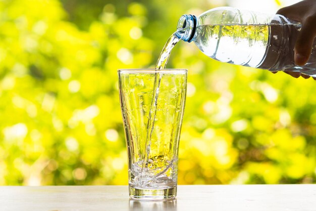 Close-up of glass bottle on table