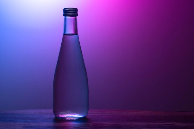 Photo close-up of glass bottle on table