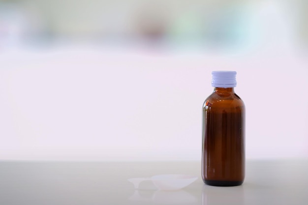 close-up of glass bottle on table