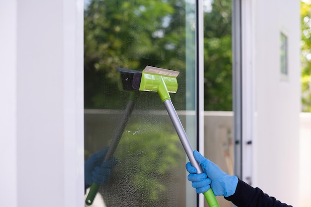 Close up to glass cleaning equipment Clean the glass doors and windows at home