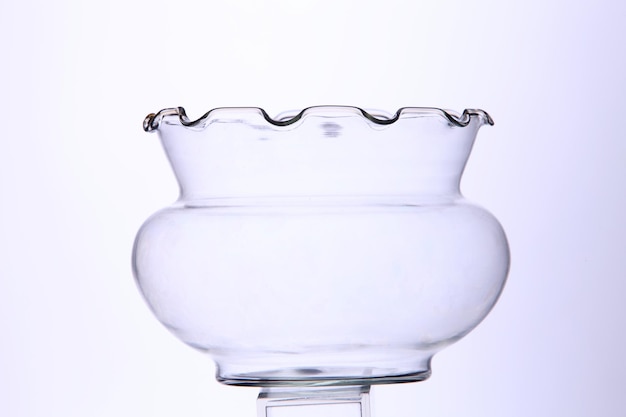 Photo close-up of glass container against white background