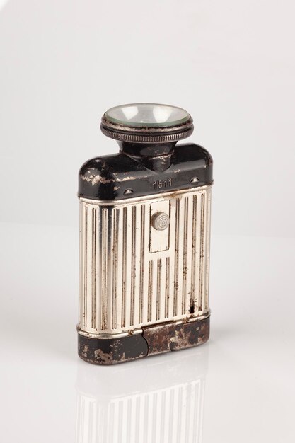 Photo close-up of glass jar on table against white background