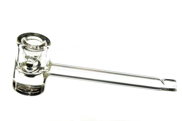 Photo close-up of glass pipe against white background