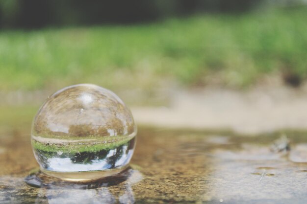 Close-up of glass of water on table