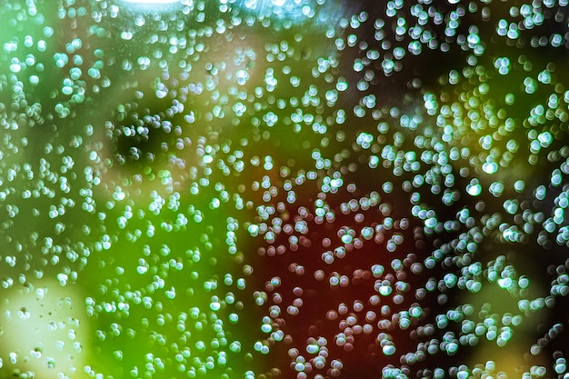 A close up of a glass with bubbles in it