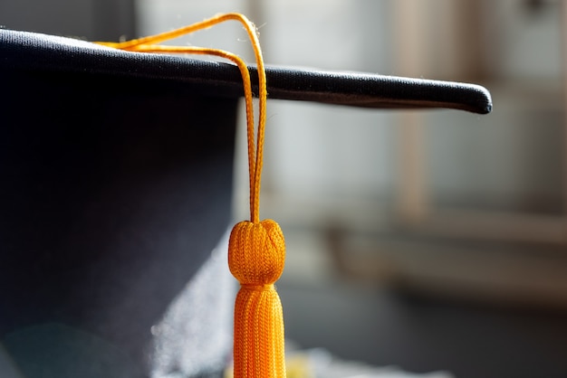 Close up graduation cap and tassle graduation cap during commencement university degree