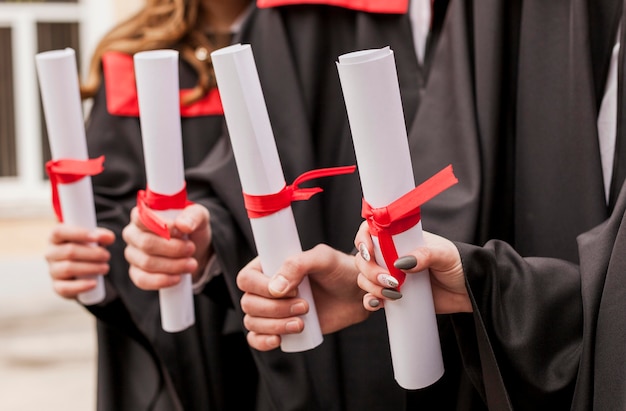 Close-up graduation diploms