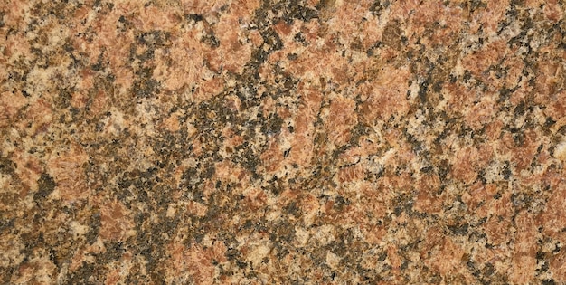 A close up of a granite with the word " on it " on the top.