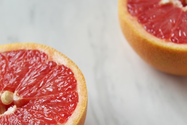 Close-up of grapefruits on table