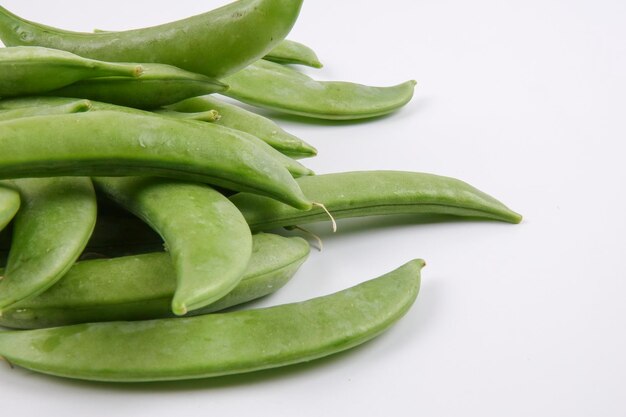 Close-up of green chili peppers on table