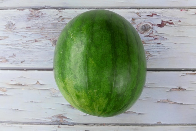 Close-up of green fruit on table