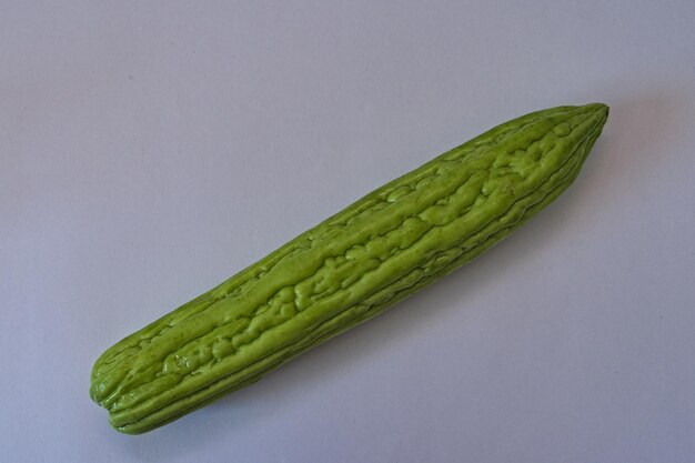 Close-up of green leaf over white background