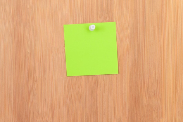 Close-up of green mailbox on wooden door