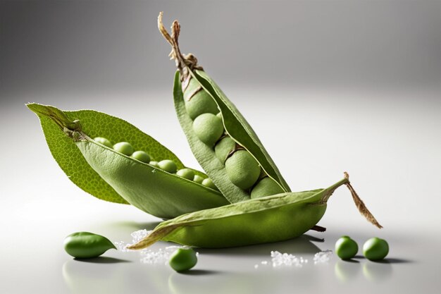 A close up of a green pea pod with salt on the table