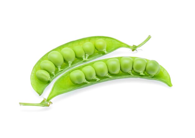 Close-up of green peas against white background