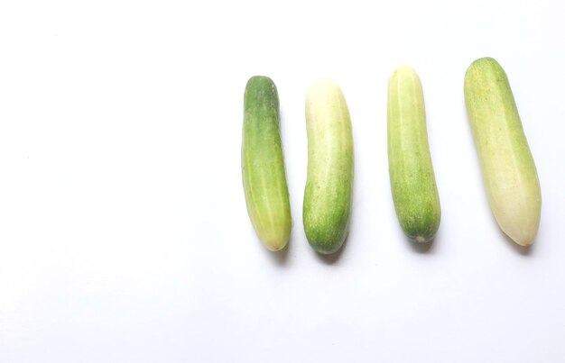 Photo close-up of green pepper against white background