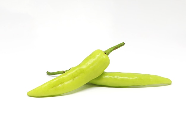 Close up green peppers isolated on white background.