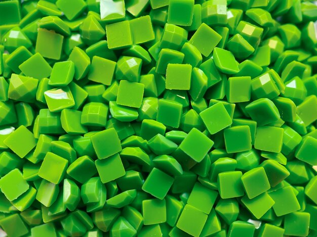 close-up, green square diamonds for diamond embroidery. hobbies and diy, materials for creating diamond embroidery