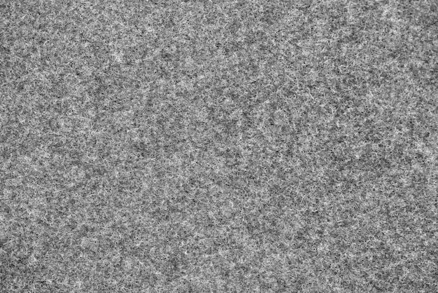 Photo close up of grey doormat background