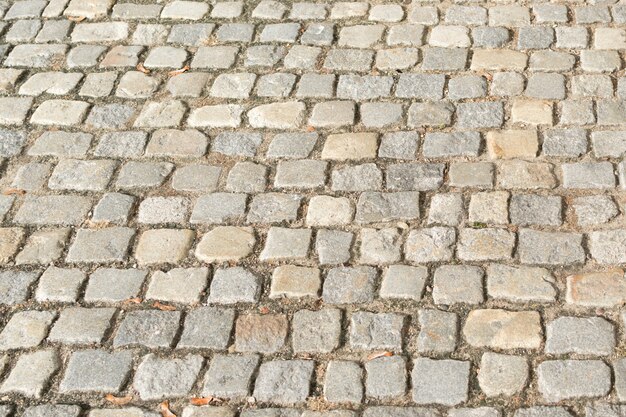 Close up on Grey Old Pavement with Big Stones