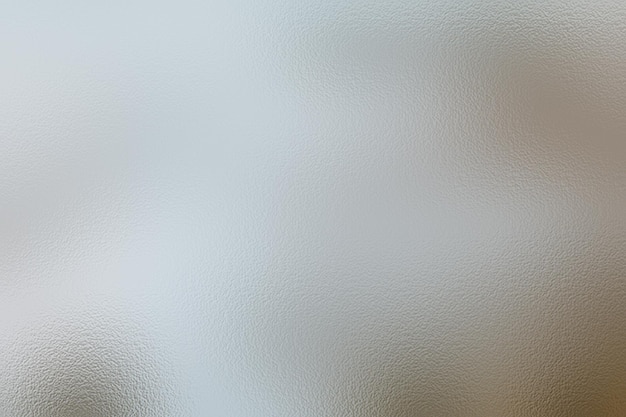 A close up of a grey and white colored background