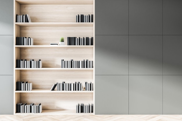 Close up of grey wooden office bookshelf with mockup place on\
wall workplace and items concept mock up 3d rendering