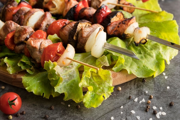 Close-up grilled chicken skewers with vegetables