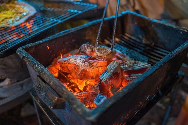 Close up Grilled girdle cake Banh Trang Nuong a famous Vietnamese street stall eatery a popular Vietnamese food in Da lat at night