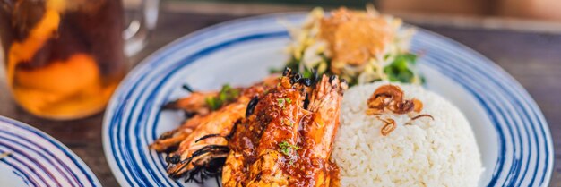 Close up grilled prawns or fresh grilled shrimps cooking seafood with rice bali kitchen banner long