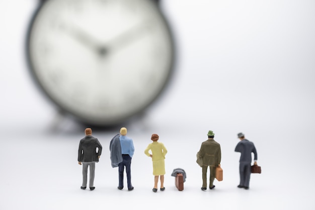 Close up of group of businessman and woman miniature figure people 