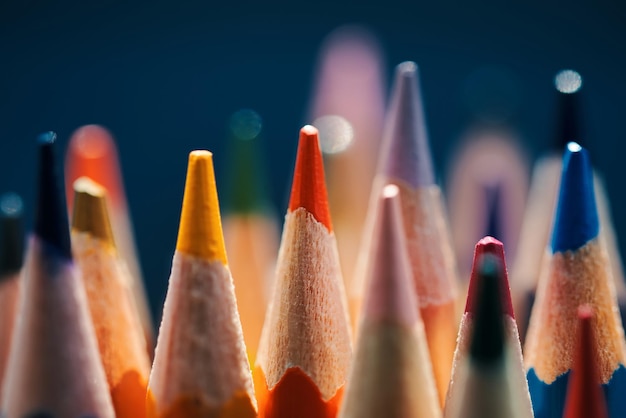 A close up of a group of colored pencils