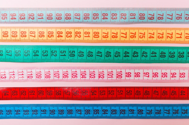 Close up of a group of colorful measure tape