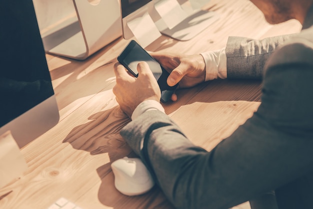 Close up.group of employees sitting at a Desk. business concept