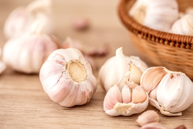 Close up  group of garlic on kitchen wooden table