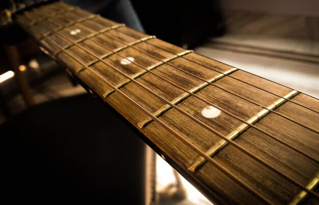 Photo close-up of guitar fretboard