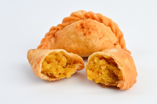 Photo close-up of gujias against white background
