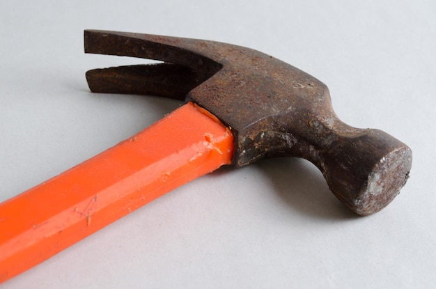 close-up of hammer on table