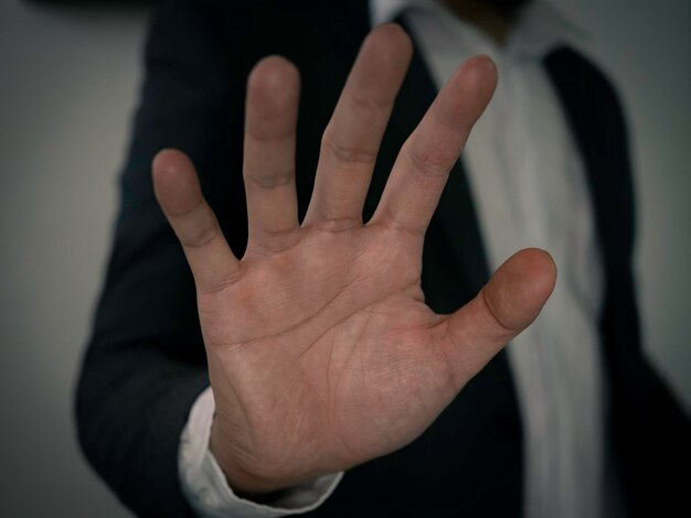 Close-up of hand against blurred background