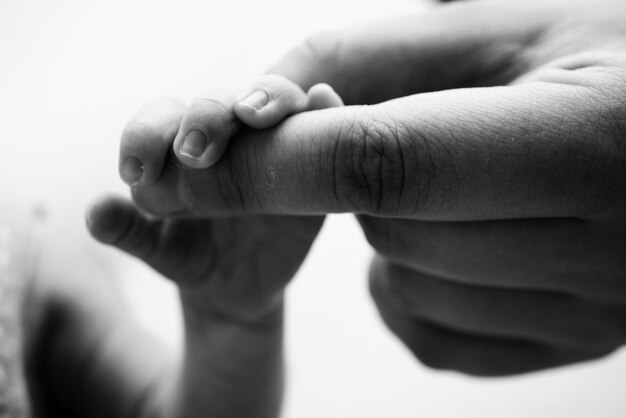 Photo close-up of hand against white background